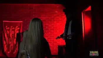 Captive blonde and brunette milf agents use their big tits to have group sex with the criminals