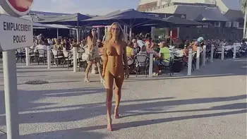 Monika Fox Walks The Streets Of Cap d'Agde Naked