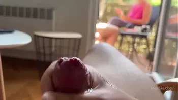 My husband is jerking off and cum in front of my stepmom a while we talk on balcony.