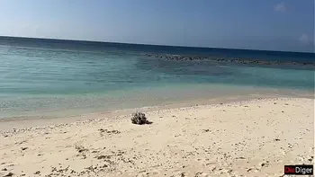 Pissed on girl on a public beach - She was shocked