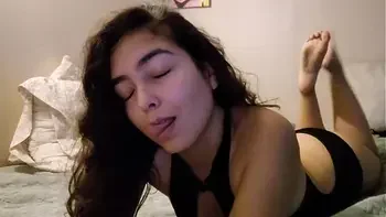 Sexy brunette masturbating while watching porn