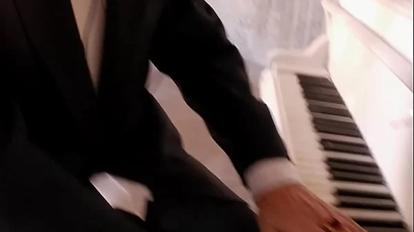 Clothed man and naked women