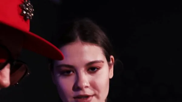 Clothed man and naked women