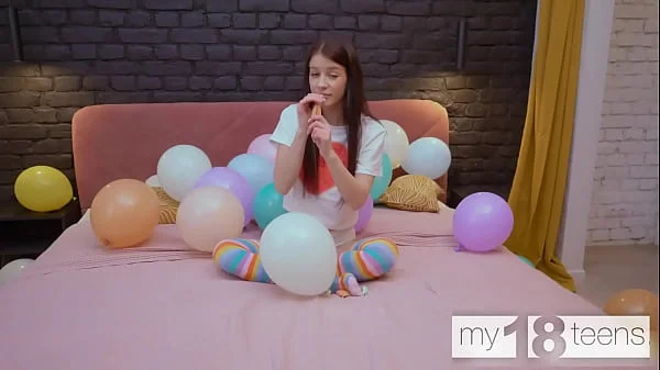 MY18TEENS - Skinny girl with small tits blows up balloons and fucks herself with a dildo
