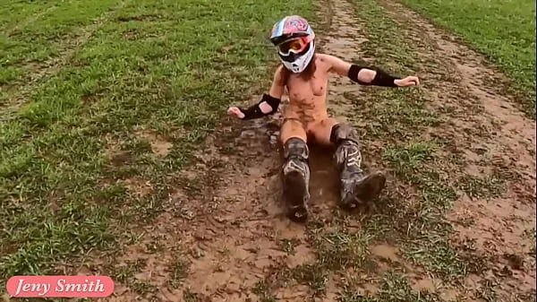 Naked woman riding a Dirt Bike