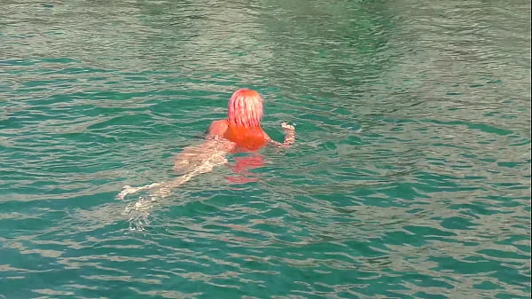 Blue water and a naked girl!