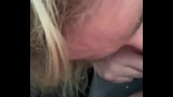 Real hooker gives head in the backseat of a car & lets him cum in her mouth