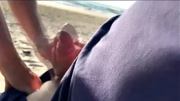 The milf suddenly came up from behind and started jerking me off in front of everyone