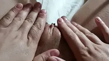close-up of masturbating the clitoris with a pussy