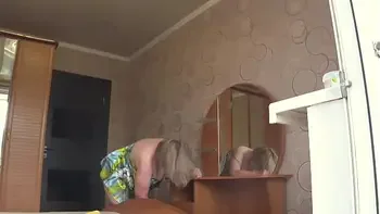 Neighbor watches chubby milf through open window. PAWG.