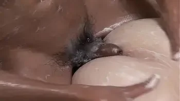 Thai Tranny Lily Gets Bathed In Cum After Sex In The Shower