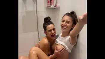 Lesbian shower explodes into sloppy double BJ and huge facial with cum swap POV Blowjob