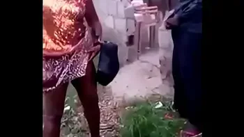 African woman fucks her man in public
