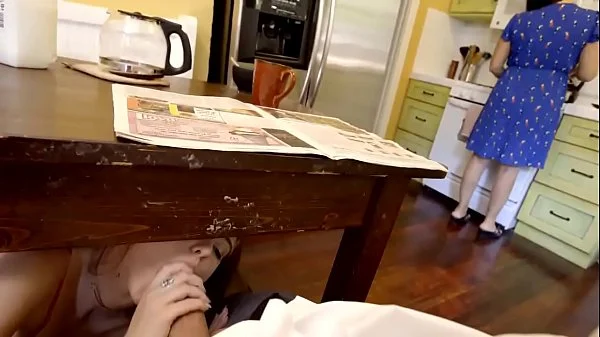 step Daughter sneaks under the table to suck daddy's cock