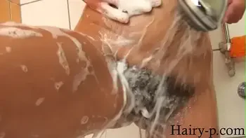 Hot milf masturbates her big hairy pussy in the shower