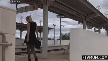 Milf masturbates on the train station