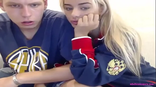 Blonde teen is making blowjob for her boyfriend at live sex webcam show