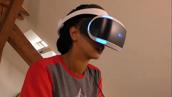 Isabel flashes her pussy and ass under her panties with a tshirt and she has a new game in her Playstation VR but she needs..