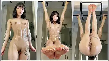 Cute Asian Muscle Girl Flexes And Works Out While Naked And Covered In Oil