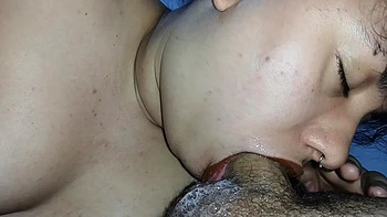 Smudging Her Big Lips With Lipstick While Devouring His Hard Cock