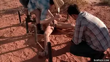 Deviant couple torment babe in desert