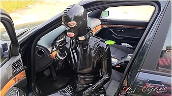 In Black Latex Public Pissing