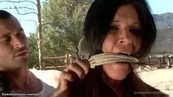 MILF is bound and anal fucked on ranch
