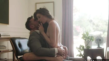 Manuel Ferrara and Elena Koshka in sensual, clothed sex action