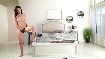 A cute Odessa girl shows off her body while wearing only thongs and bra