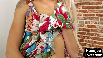 Beautiful petite blondie wanking a dick