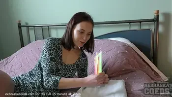 hot skinny girl letting camera guy finger her pussy and open it up with glowsticks