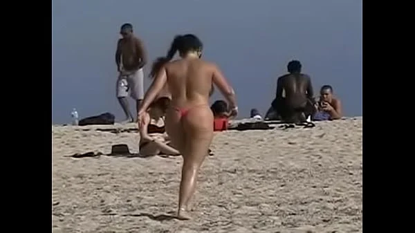 Exhibitionist Wife 19 - Anjelica teasing random voyeurs at a public beach by flashing her shaved cunt!