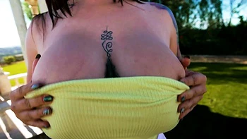 Tattooed Babe Avalon Mira Flaunts Her Big Tits Outdoors