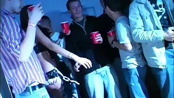 Dick eating party whore goes down on big cock at party