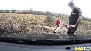 Sexy as hell redhead MILF with big boobs fucked by fake cop