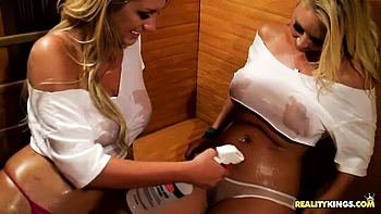 An awesome lesbian scissoring with a long-legged busty Molly Cavalli