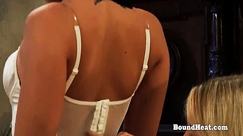 White lingerie scene with enticing women from Bound Heat
