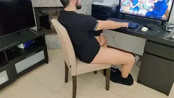 mature gives her stepson a handjob while watching porn