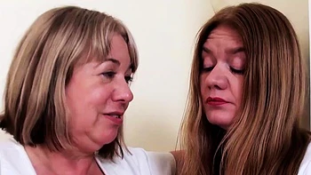 Busty Mature Trisha Handles Two Eager Studs