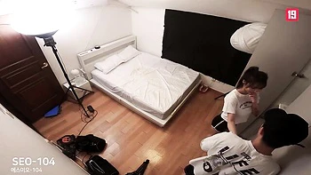 Korean babe with big tits sucks cock and jerks off