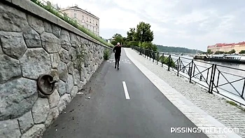 Hot blonde Claudia Macc pees outdoors smiling nude