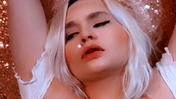 Cute blonde milf strips solo showing big tits
