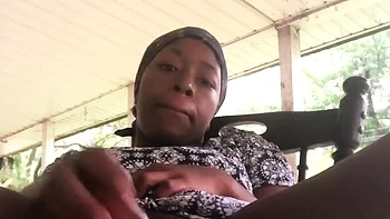 Black Babe Masturbates and Squirts in Rain