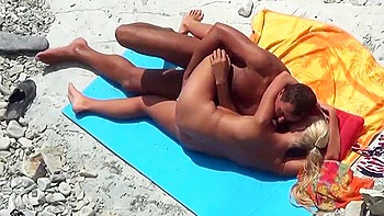 Spying For Couple Of Nudists Chilling On The Beach