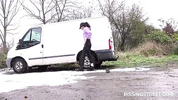 Brunette Mini Mitzi X pissing wild outdoors