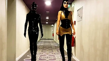 Brunette babe solo fingers her latex pussy