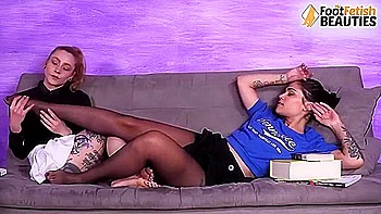 Lesbian Nylon Fetish: Tattooed Brunette & Redhead Toes Play