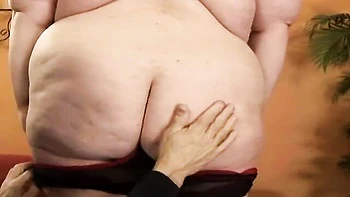 BBW pornstar sucks and strokes her big tits and ass