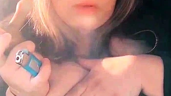 Big-titted MILF masturbates with dildo