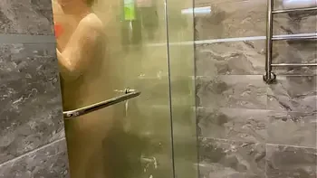 A young pervert looked at his stepmother in the shower